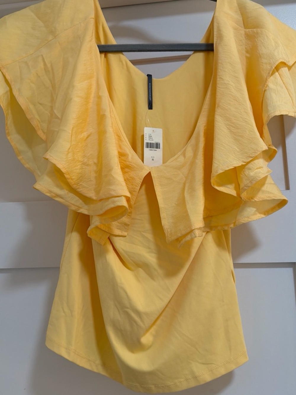 Anthropologie Soft Yellow Ruffle Sleeve Blouse